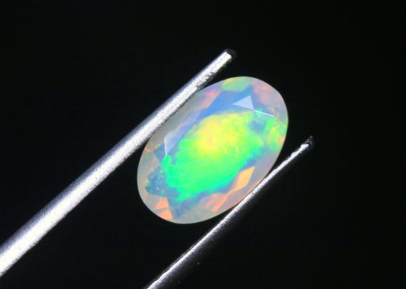 Ethiopian Opal Gemstone: 1.15 CT Galaxy Fire Welo Oval Loose Stone For Jewelry Making