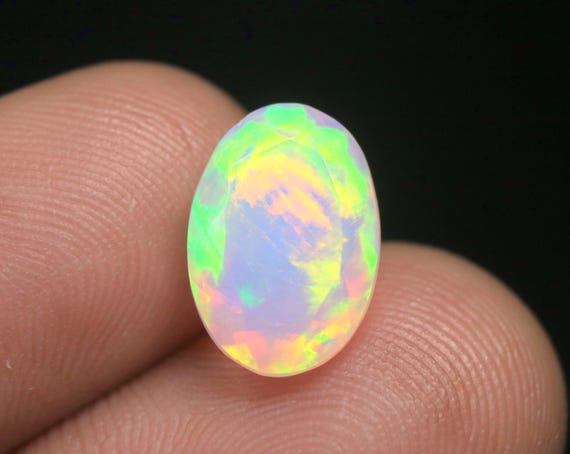 3.05 CT Welo Opal Loose Gemstone: Oval Natural Fire Ethiopian Opal 12.70x9x6.40 MM