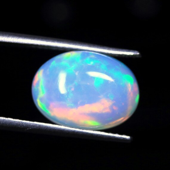 Ethiopian Opal Cabochon: 3.40 CT Oval Rainbow Fire Gemstone