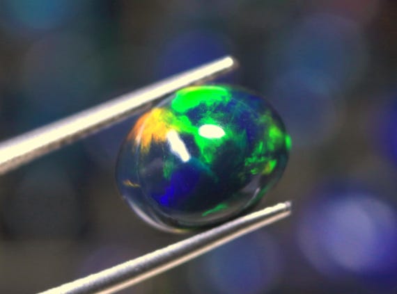 2.65 CT Ethiopian Welo Opal Cabochon: Flashy Fire Black Gemstone