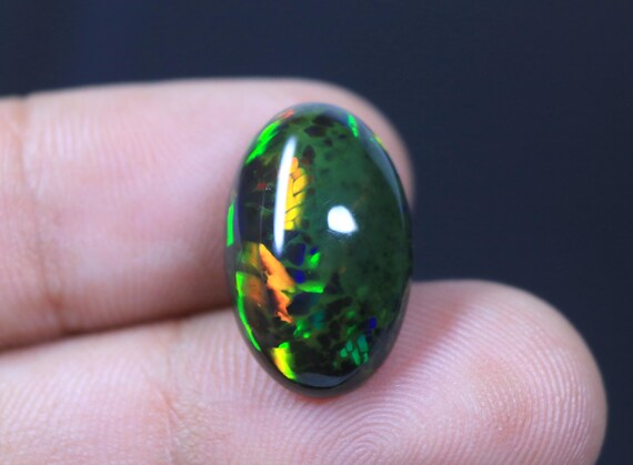 AAA+ Unique Black Opal Oval Cabochon, 8.00 Carat Rainbow Fire Ethiopian Opal Loose Gemstone
