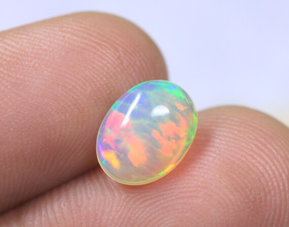 1.35 Carat Oval Shape Natural Fire Ethiopian Opal Loose Cabochon Gemstone For Jewelry Making
