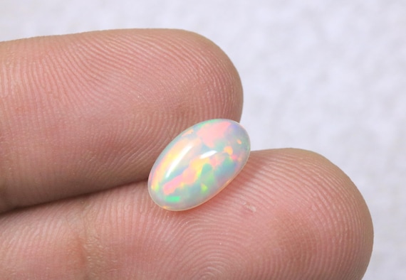 Natural Ethiopian Opal Cabochon, Oval Rainbow Gemstone (1.05ct)