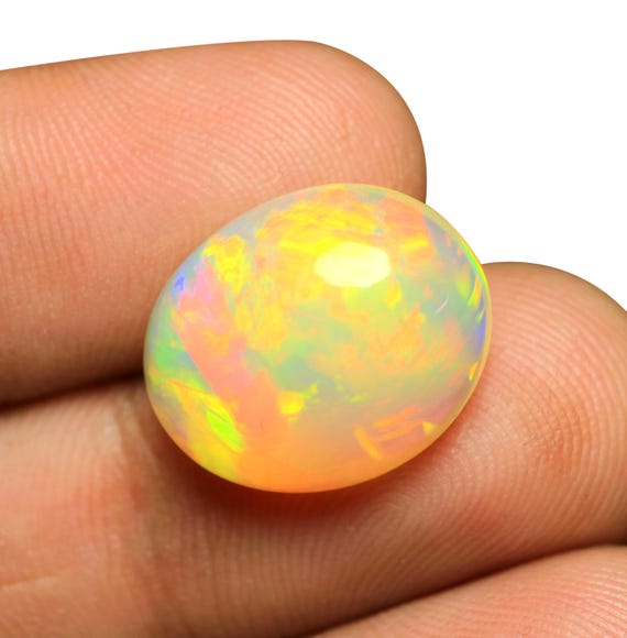 Welo Opal Cabochon: 8.35 CT Ethiopian Fire Opal, AAA Quality (17.30x14x7.70 MM)