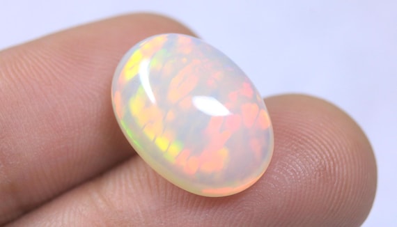 Oval Honeycomb Ethiopian Opal Cabochon: 7.75 Carat Natural Play of Color Opal For Jewelry