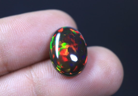 AAA+ Unique Black Opal Oval Cabochon, Rainbow Ethiopian Opal Gemstone, October Birthstone (4.50 Carat)