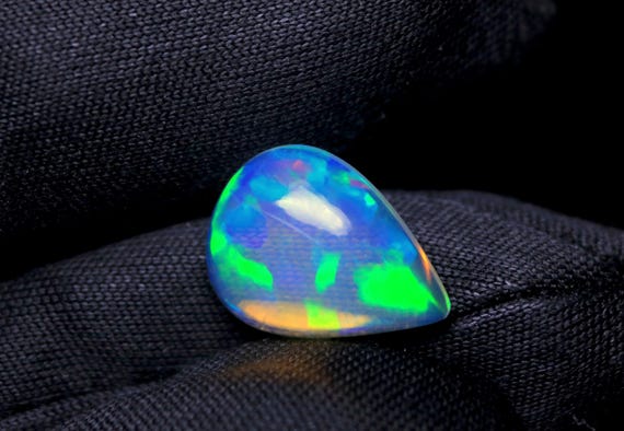 Welo Opal Cabochon: 2.30 CT Pear Shape Ethiopian Gemstone