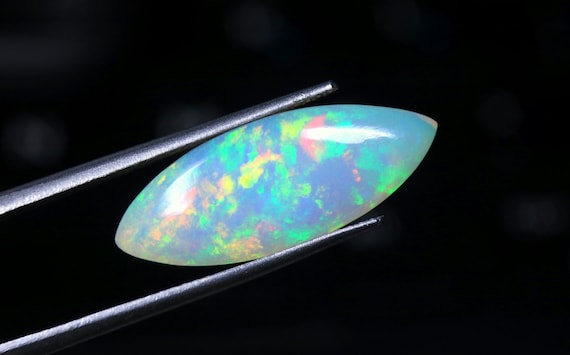 AAA Ethiopian Welo Opal Loose Gemstone: Marquise Cabochon, 6.40 CT