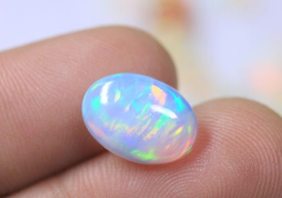 Oval Opal Loose Cabochon: 2.30 CT Multi Fire Ethiopian Opal Gemstone For Jewelry Making