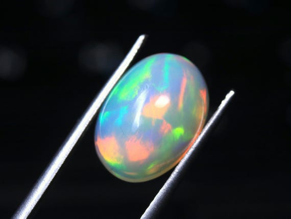 AAA Ethiopian Welo Opal, Oval Cabochon, Multi Fire Gemstone (5.10 CT)