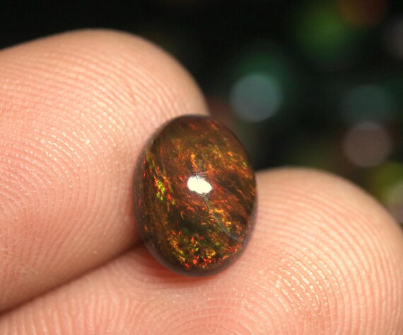 Black Ethiopian Welo Opal Cabochon: 1.40 CT Oval Galaxy Fire Opal Loose Gemstone