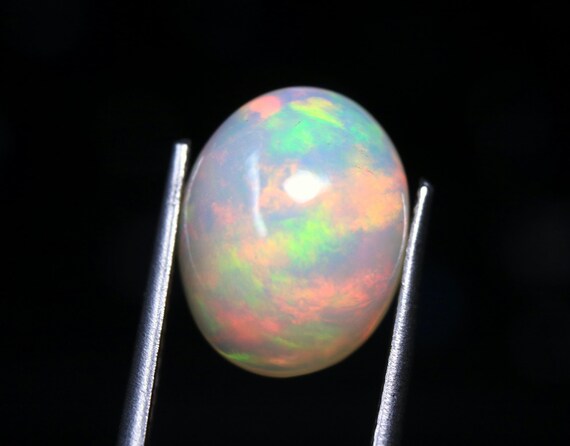 AAA Ethiopian Opal Gemstone, Rainbow Multi Fire Cabochon (12.70x10x7.20 MM)