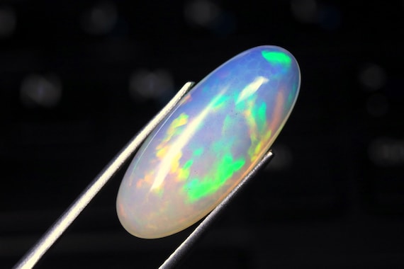 AAA Ethiopian Opal Cabochon: 7.60 CT Honeycomb Gemstone, 24.40mm