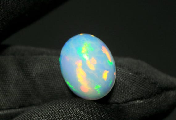 Welo Opal Cabochon: 4.20 CT Oval Multi-Fire Gemstone, AAA Grade