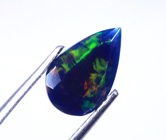 Faceted Ethiopian Opal: 1.55 CT Pear Cut Loose Gemstone