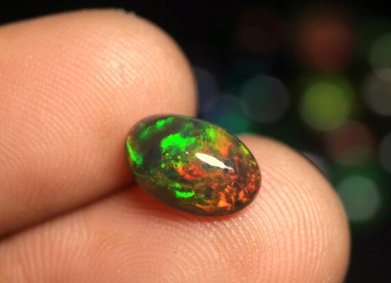 Genuine Black Ethiopian Opal Cabochon: 1.45 CT Oval Multi Fire Jelly Opal Loose Gemstone