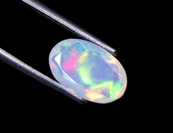 Faceted Ethiopian Opal Gemstone: 1.30 CT Oval Welo Opal