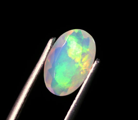 Faceted Ethiopian Opal Gemstone: 0.90 CT, Oval Welo Opal (9x6x3.50 MM)