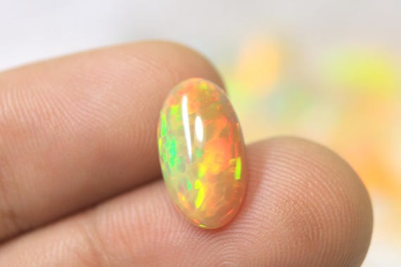 Rainbow Ethiopian Welo Opal Cabochon: 2.60 CT Oval Yellow Opal Gemstone 14.80x8.40x4 MM