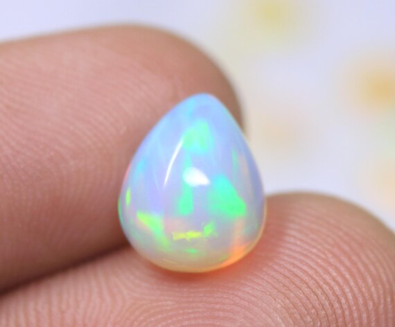 Healing Crystal Opal Pear Cabochon, Multicolor Ethiopian Opal Gemstone For Jewelry (2.30 Carat)
