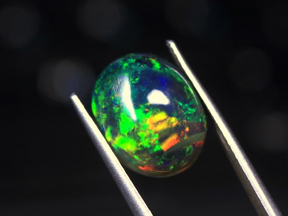 Black Ethiopian Opal Gemstone, 4.25 CT Oval Welo Opal Cabochon