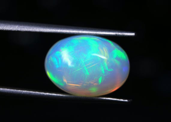 Ethiopian Fire Opal Cabochon: Hand Polished Gemstone (3.80 CT, 12.60x9.30x7 MM)
