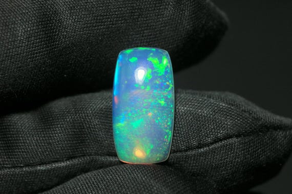 AAA Fire Opal Cabochon: 4.10 CT Cushion Cut Gemstone