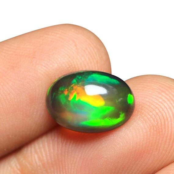 Oval Ethiopian Opal Cabochon: 3.05 CT Multi Fire Gemstone (13x9x5.50 MM)