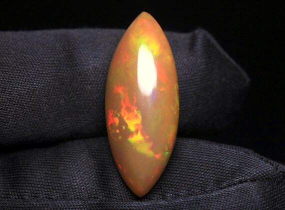Ethiopian Opal Cabochon: 9.95 CT Brown Loose Gemstone For Jewelry, October Birthstone (26.80x10.70x8 MM)