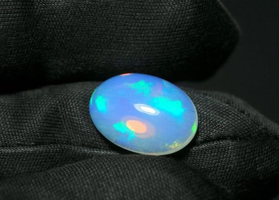 Oval Ethiopian Opal Gemstone: 3.50 CT Multi Fire Cabochon