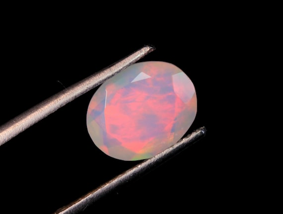 Faceted Ethiopian Welo Opal Gemstone: 1.20 CT Oval Jewelry Stone