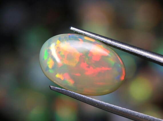 AAA Ethiopian Welo Opal Cabochon: 3.55 CT Rainbow Gemstone, 15x9.60mm