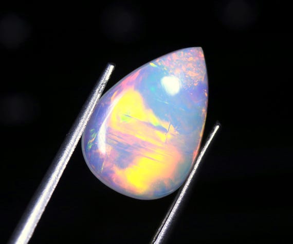 Welo Opal Cabochon: 2.90 CT Pear Shape Ethiopian Gemstone (14.60x10x4.40 MM)