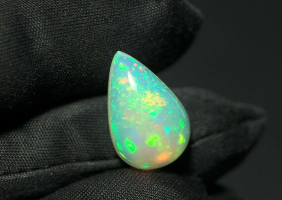 Welo Opal Cabochon: 7.70 CT Pear Shape Ethiopian Gemstone