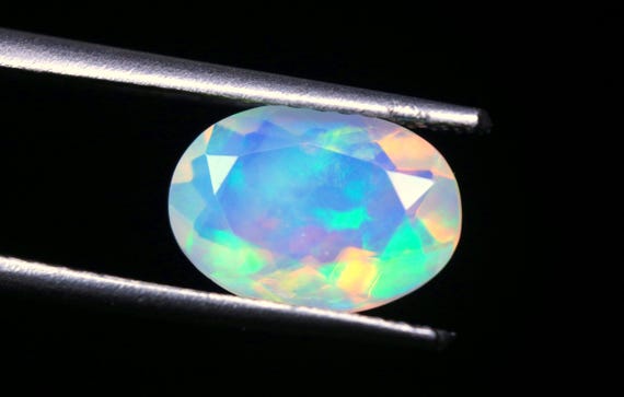 Natural Ethiopian Opal Gemstone: AAA Grade Oval Cut Fire Welo Stone (9.50x6.50x4 MM)