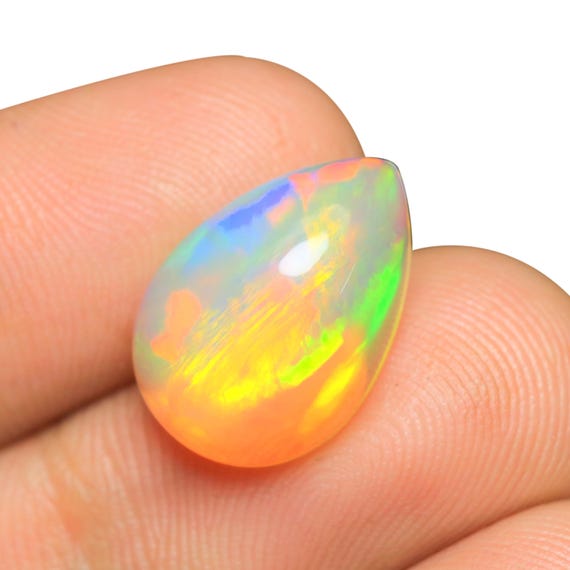 6.00 CT Pear Shape Ethiopian Opal: Flashy Fire Gemstone (16.60x11.70x6.70 MM)