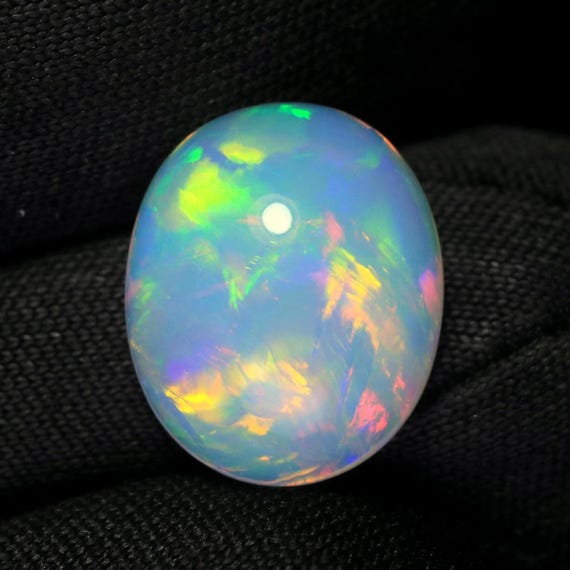 Ethiopian Welo Opal Cabochon: 2.75 CT Oval Multi Fire Gemstone, 12x10 MM