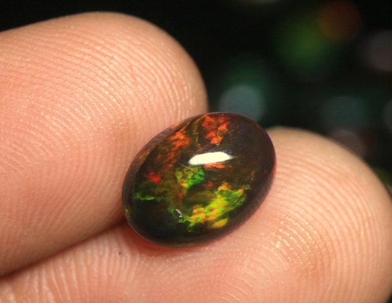 Rainbow Welo Opal Gemstone: 1.45 CT Oval Shape Ethiopian Black Opal Jewelry Stone