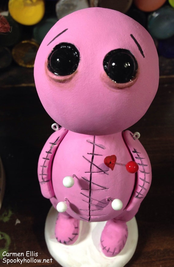 clay voodoo doll