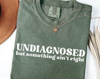 Undiagnosed But Something Ain’t Right Comfort Colors Shirt, Undiagnosed Shirt Funny Quote, Mental Health Humor Tee,Something Ain’t Right Tee