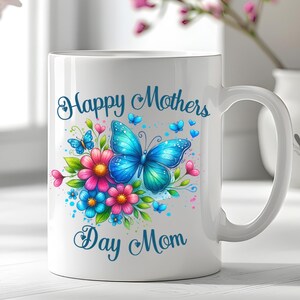 May include: White ceramic mug with a blue butterfly and colorful flowers. The mug has the text "Happy Mothers Day Mom" in blue.