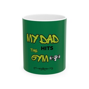 My Dad Hits the Gym - Funny Ceramic Mug for Fitness Lovers, Gift for Dad, Workout Motivational Mug, 11oz & 15oz Available, Father&#39;s [...]