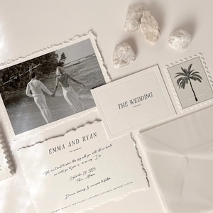 May include: A collection of wedding stationery, including a black and white photo of a couple, invitation cards, and an envelope. The invitation cards feature the names "Emma and Ryan" and the date "September 24, 2025".