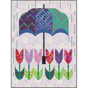 May include: A quilt featuring a large umbrella with a multicolored plaid and polka dot canopy. Below the umbrella are six stylized tulips with vibrant floral patterns and green leaves. The background is a light pink fabric with circular motifs.