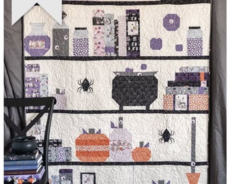 Melissa Mortenson Spooky Shelfie Quilt Pattern - 48" by 68" -  features potion books, bottles, witches hat and broom, pumpkins, and spiders.