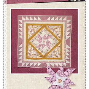 Op de afbeelding: Een quiltpatroon genaamd "Sophie's Pinwheel" van Pink Hippo Quilts. Het patroon heeft een roze en wit molenwiekenontwerp met een gele rand. Het patroon wordt getoond op een roze achtergrond met een wit nijlpaardlogo.