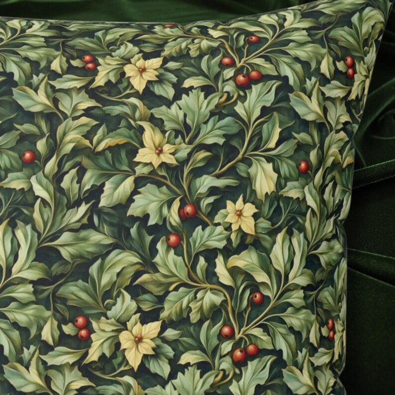 May include: Decorative pillow with a botanical pattern featuring green leaves, yellow flowers, and red berries. The design is set against a dark background, creating a classic and elegant look. The pillow's fabric has a soft, textured appearance.