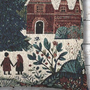 May include: A decorative pillow with a woven tapestry design. The image features a detailed illustration of a house with a red brick facade, a pathway, and two figures. The color palette includes shades of red, green, and cream.