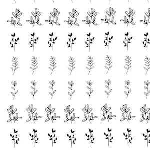 May include: A sheet of black and white floral stickers. The stickers feature various designs of simple flowers and leaves.