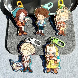 Monster Hunter Wilds Acrylic Keychain: Alma, Gemma, Nata, Olivia, Palico